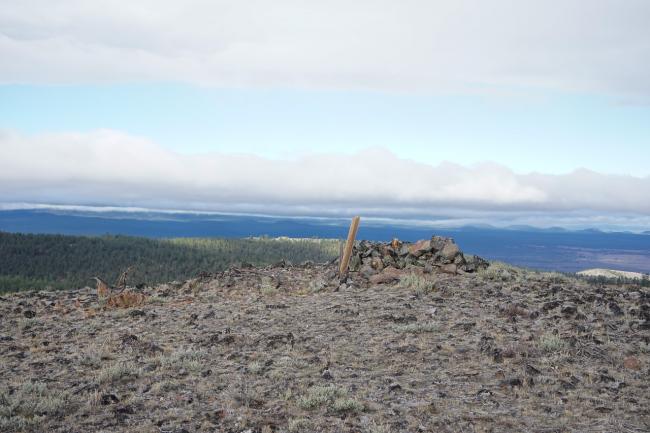 wooden post on summit